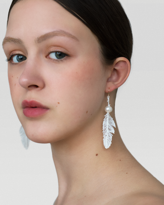Freshwater pearl earrings. White feather earrings 