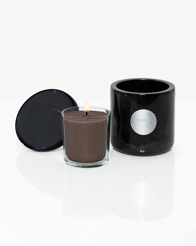 Dark woods scented candle. Refillable scented candle in marble vessel 
